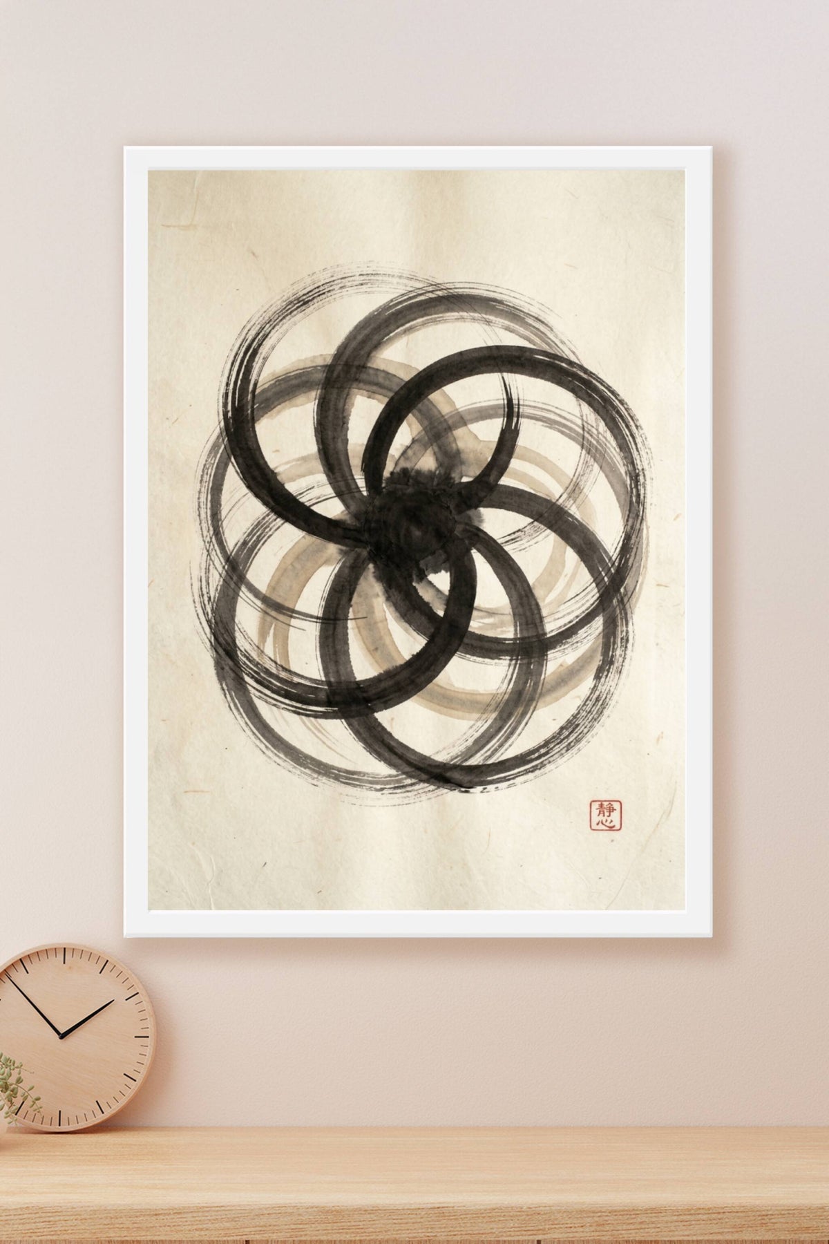 A minimalist sumi-e ink wash art print of several large overlapping enso circles sweeping across the sheet and conver...