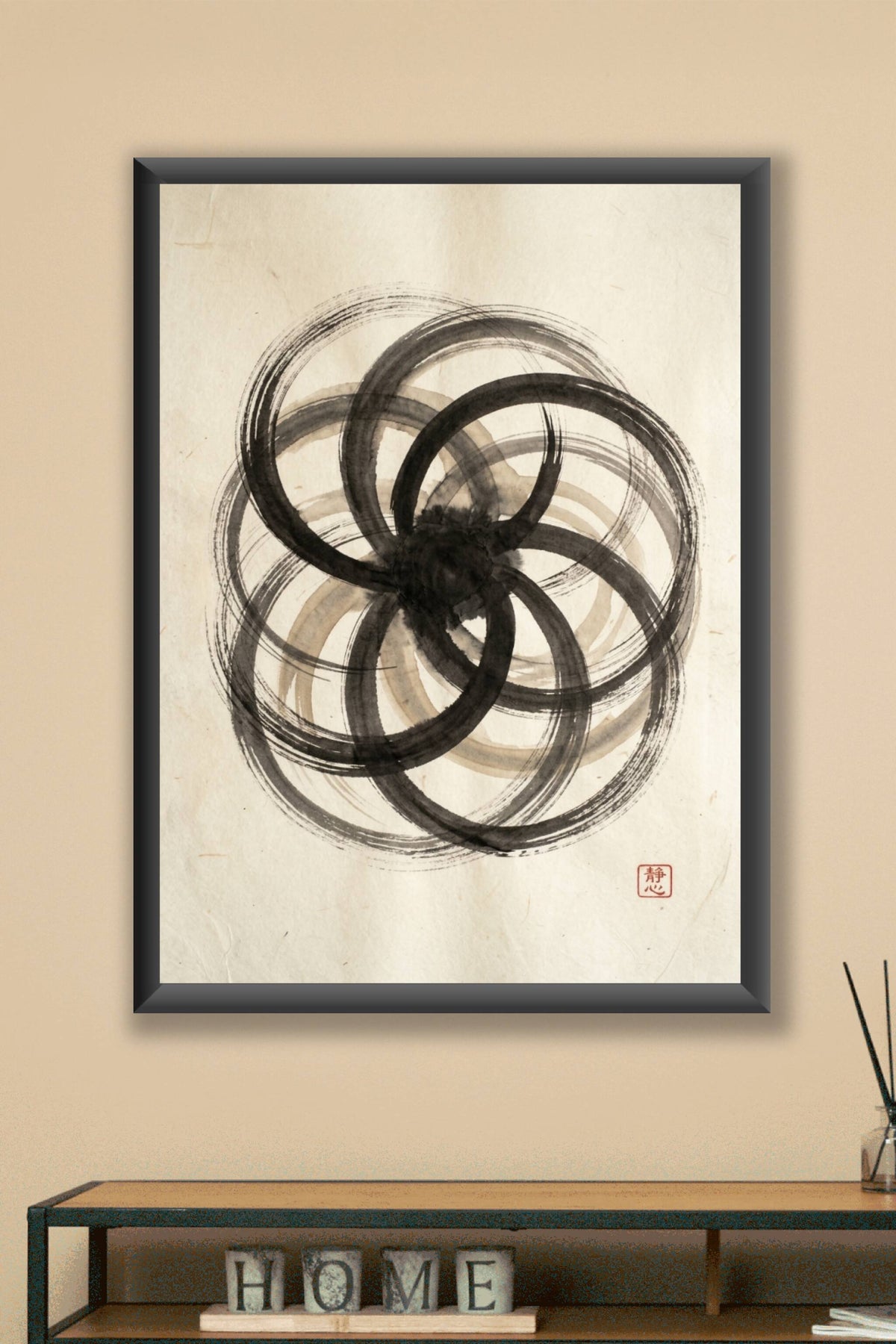 A minimalist sumi-e ink wash art print of several large overlapping enso circles sweeping across the sheet and conver...